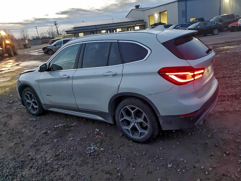 Photo 2 from auction – 2017 BMW X1 XDRIVE2 with VIN WBXHT3C35H5F74308