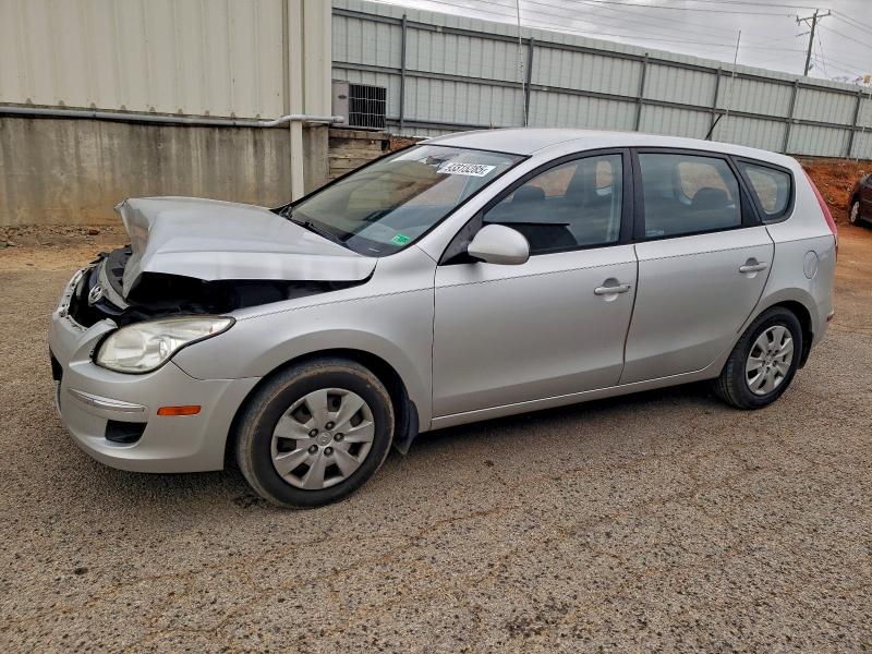 HYUNDAI ELANTRA TO 2011 with VIN KMHDB8AEXBU087899 - Photo from auction