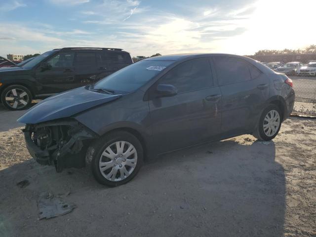 TOYOTA COROLLA L 2015 with VIN 5YFBURHE7FP297929 - Photo from auction