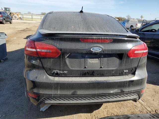 Photo 6 from auction – 2016 FORD FOCUS SE with VIN 1FADP3F28GL392070