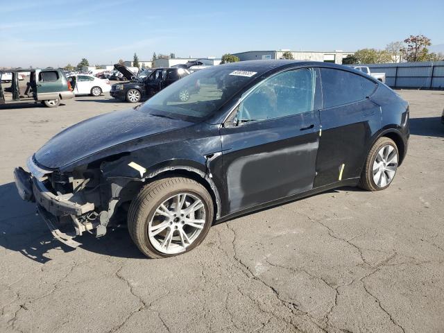 TESLA MODEL Y 2022 con VIN 7SAYGAEE1NF514878 - Foto de la subasta