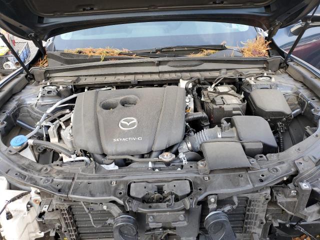 Photo 12 from auction – 2024 MAZDA CX-50 SELE with VIN 7MMVABAM1RN165149