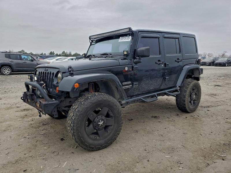 JEEP WRANGLER U 2011 with VIN 1J4BA3H1XBL565694 - Photo from auction