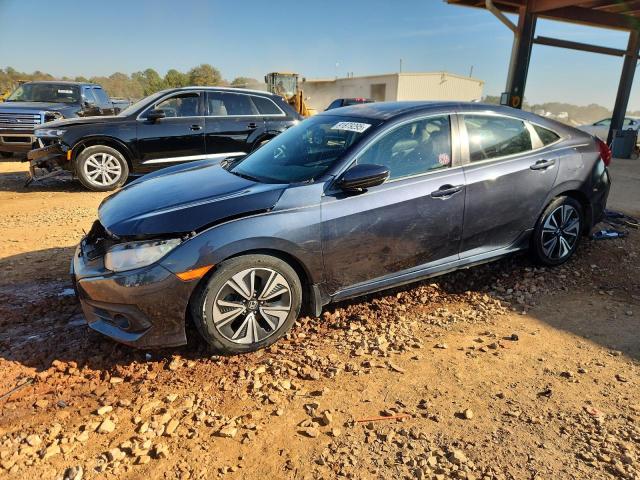 Photo 1 from auction – 2017 HONDA CIVIC EX with VIN 2HGFC1F35HH637774