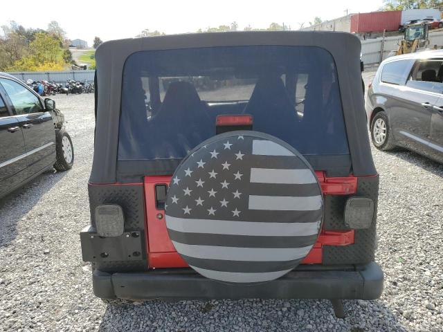 Photo 6 from auction – 2002 JEEP WRANGLER with VIN 1J4FA39S02P720075