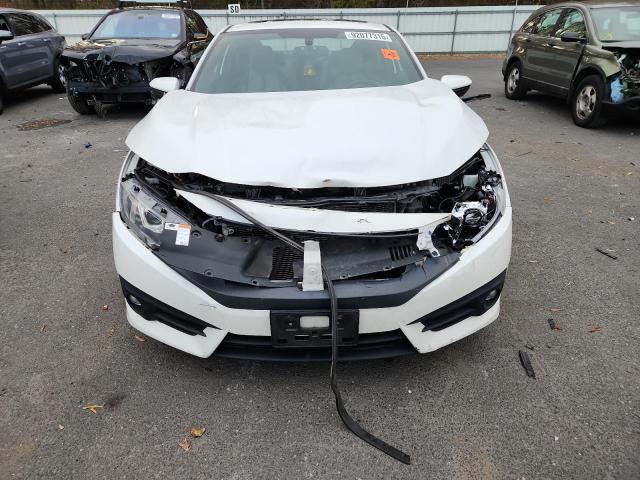 Photo 5 from auction – 2018 HONDA CIVIC EX with VIN 2HGFC3B34JH350627