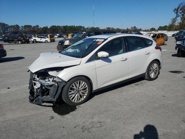 FORD FOCUS TITA 2016 with VIN 1FADP3N22GL299420 - Photo from auction