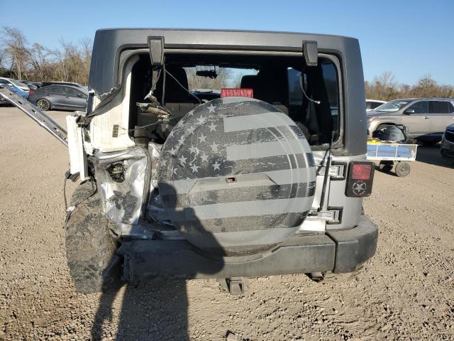 Photo 6 from auction – 2013 JEEP WRANGLER U with VIN 1C4BJWDG2DL583336