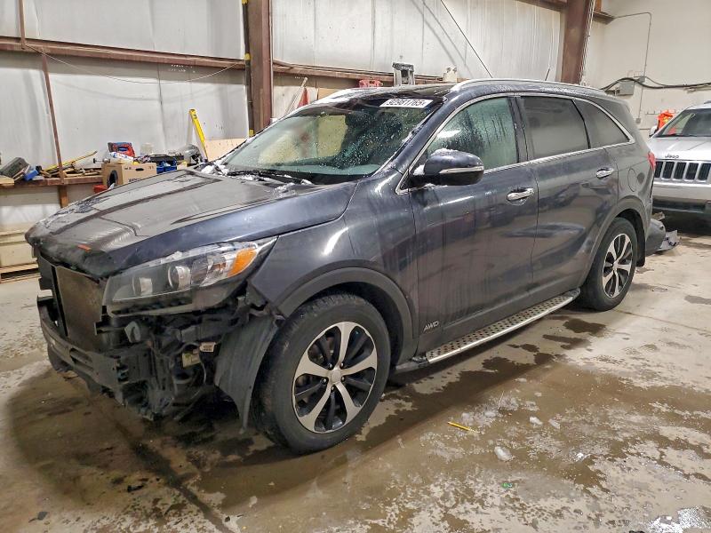 KIA SORENTO EX 2016 with VIN 5XYPHDA51GG105580 - Photo from auction