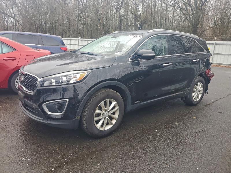 KIA SORENTO LX 2016 with VIN 5XYPGDA31GG022930 - Photo from auction