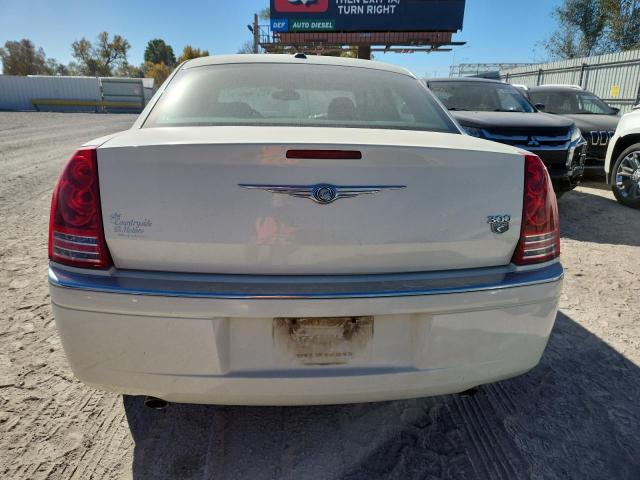 Photo 6 from auction – 2009 CHRYSLER 300C with VIN 2C3KA63T99H523061
