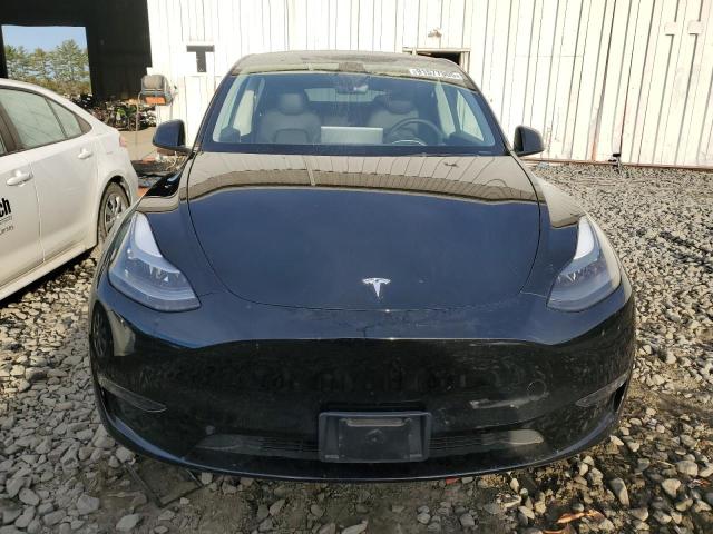 Photo 5 from auction – 2023 TESLA MODEL Y with VIN 7SAYGDEE8PF760010