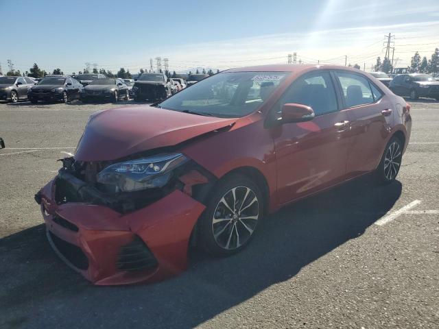 TOYOTA COROLLA L 2018 with VIN 5YFBURHE2JP757863 - Photo from auction