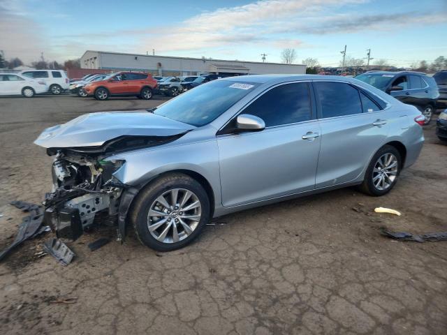 TOYOTA CAMRY LE 2016 with VIN 4T4BF1FK6GR538857 - Photo from auction