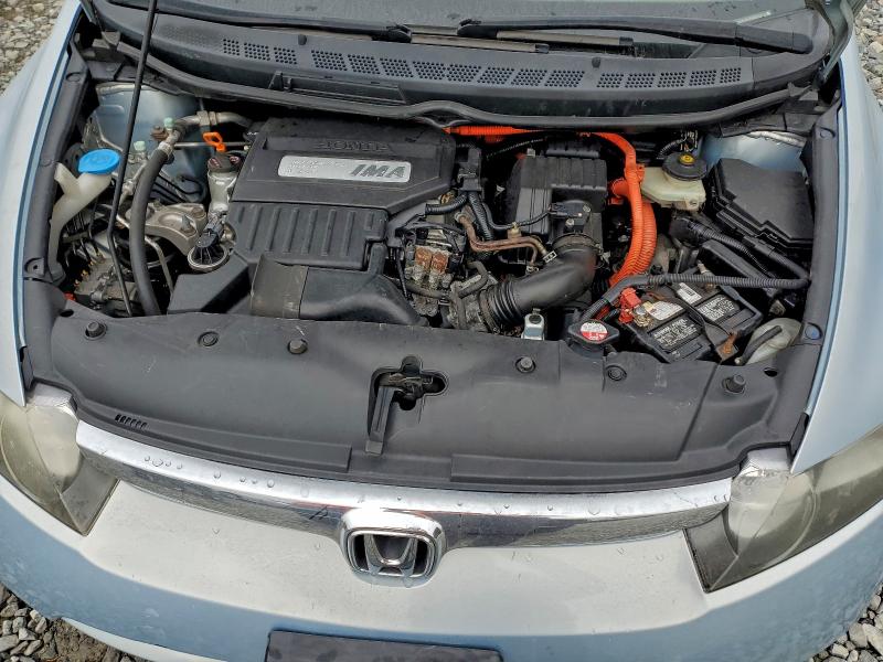 Photo 11 from auction – 2006 HONDA CIVIC HYBR with VIN JHMFA36216S021503