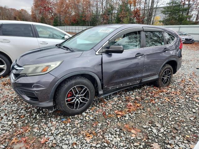 HONDA CR-V LX 2015 with VIN 3CZRM3H33FG702453 - Photo from auction