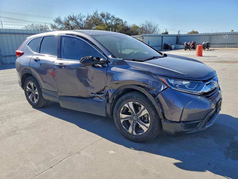 Photo 4 from auction – 2017 HONDA CR-V LX with VIN 7FARW5H37HE013055