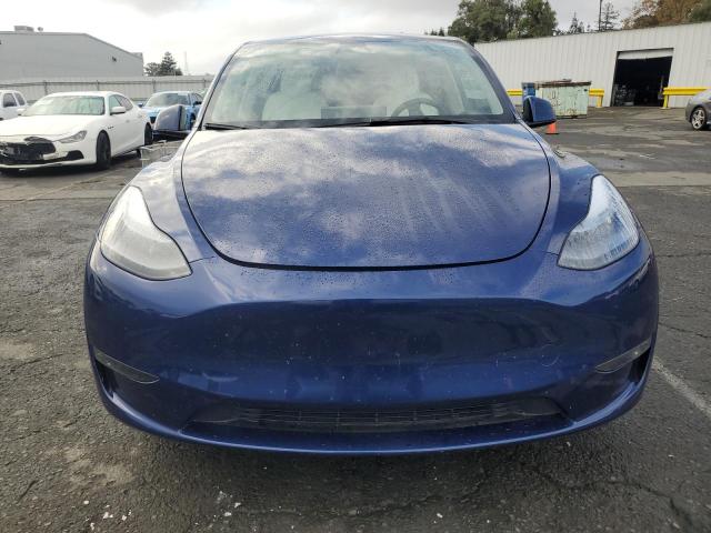 Photo 5 from auction – 2023 TESLA MODEL Y with VIN 7SAYGAEE0PF697080