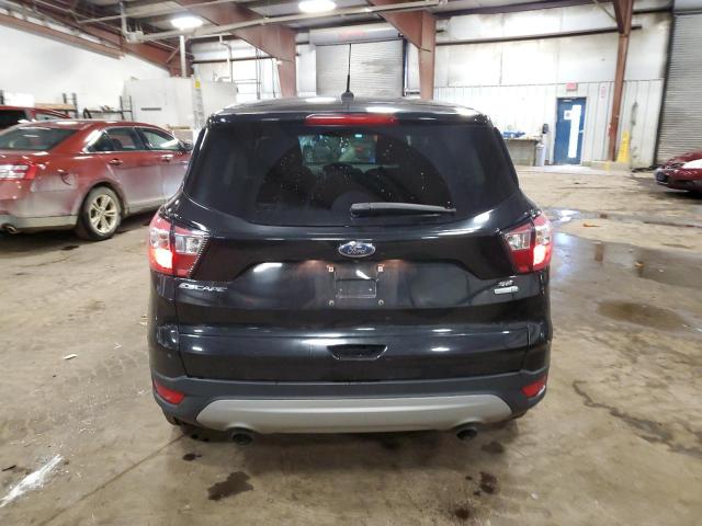 Photo 6 from auction – 2017 FORD ESCAPE SE with VIN 1FMCU9GD2HUD75158