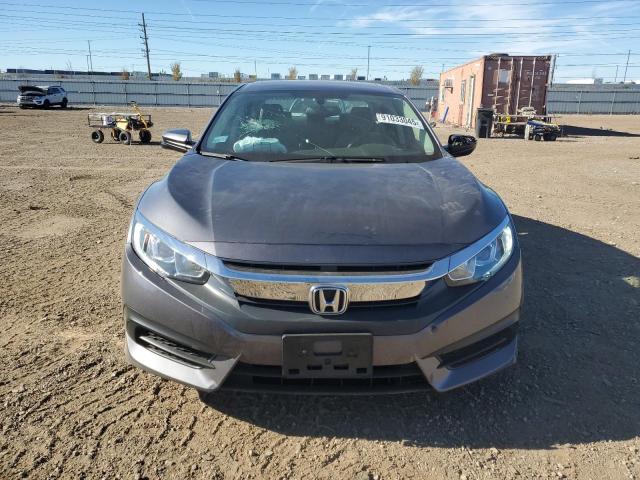 Photo 5 from auction – 2018 HONDA CIVIC EX with VIN 2HGFC2F7XJH595648