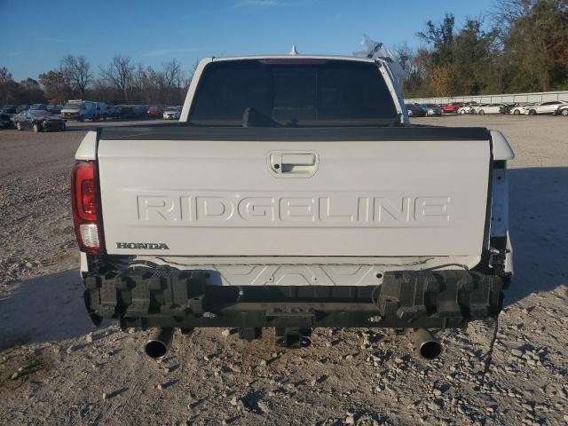 Photo 6 from auction – 2024 HONDA RIDGELINE with VIN 5FPYK3F56RB009762