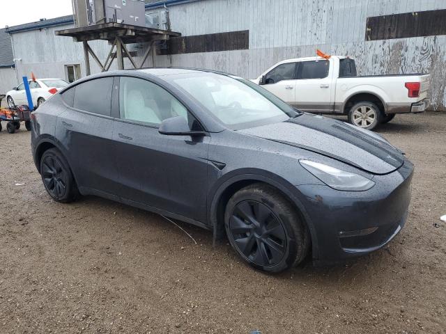 Photo 4 from auction – 2025 TESLA MODEL Y with VIN 7SAYGDEE5SF298479