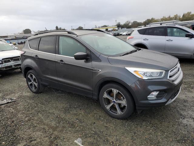 Photo 4 from auction – 2018 FORD ESCAPE SEL with VIN 1FMCU0HD9JUB14576