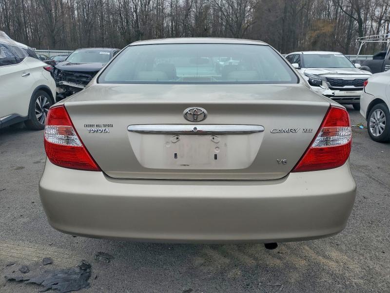 Photo 6 from auction – 2002 TOYOTA CAMRY LE with VIN 4T1BF30K82U537054