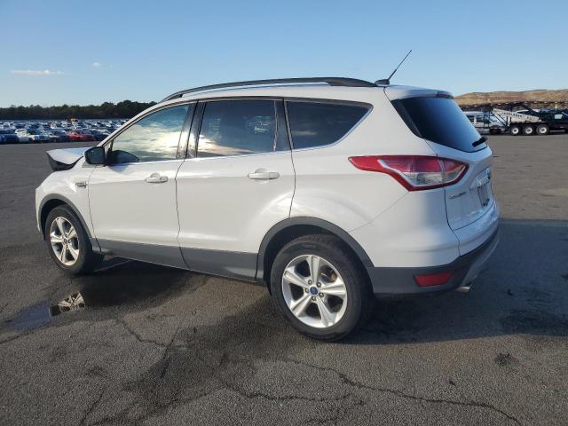 Photo 2 from auction – 2016 FORD ESCAPE SE with VIN 1FMCU9GX4GUB18446