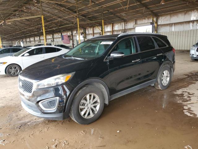 KIA SORENTO LX 2016 with VIN 5XYPG4A3XGG166329 - Photo from auction