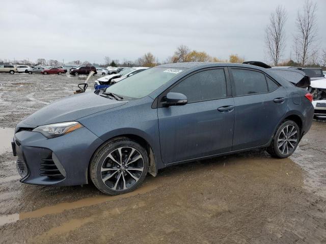 TOYOTA COROLLA L 2017 with VIN 2T1BURHE4HC822111 - Photo from auction