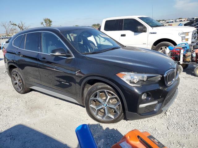 Photo 4 from auction – 2018 BMW X1 with VIN WBXHU7C3XJ5H44771