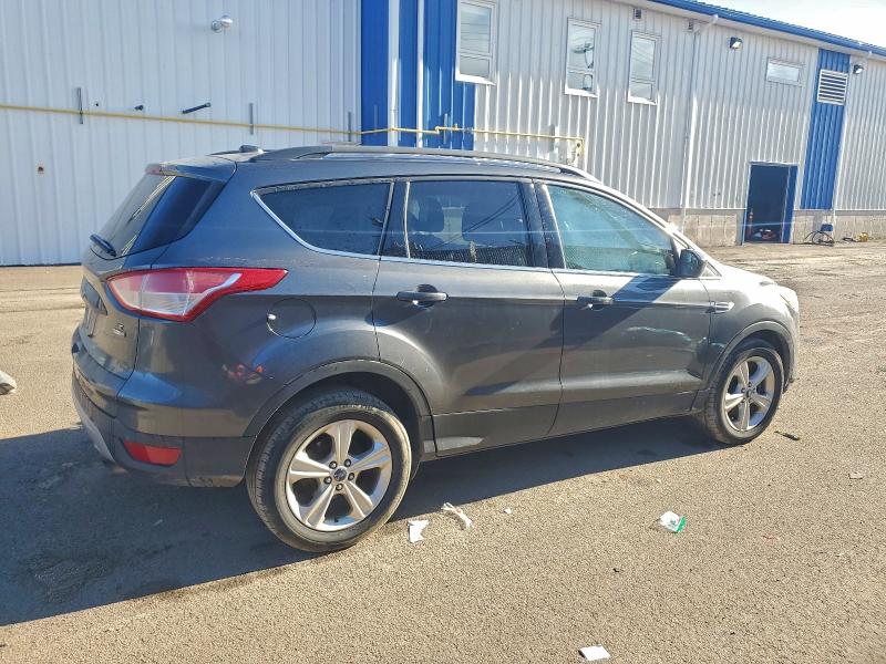 Photo 3 from auction – 2016 FORD ESCAPE SE with VIN 1FMCU9GX2GUA33749