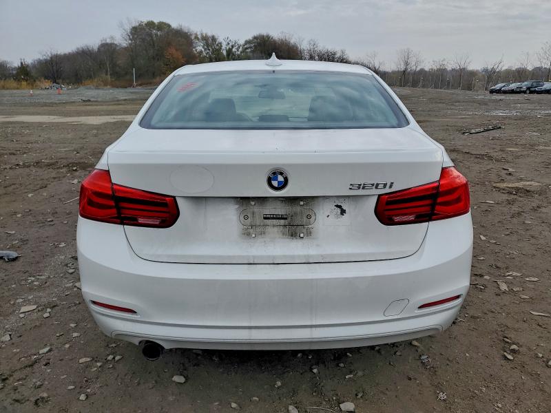 Photo 6 from auction – 2016 BMW 320 I with VIN WBA8E1G55GNT34353