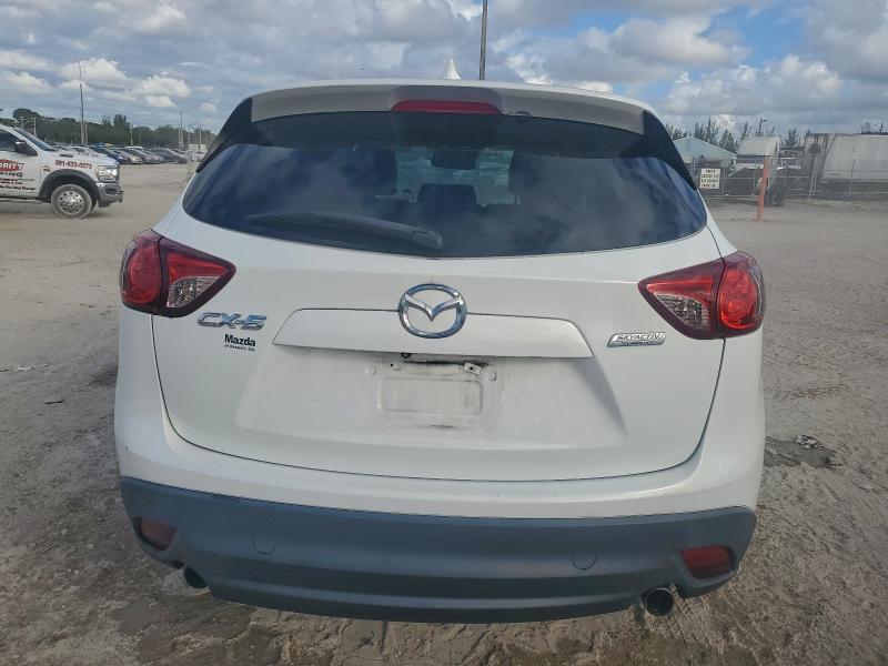 Photo 6 from auction – 2014 MAZDA CX-5 GT with VIN JM3KE2DY1E0366604