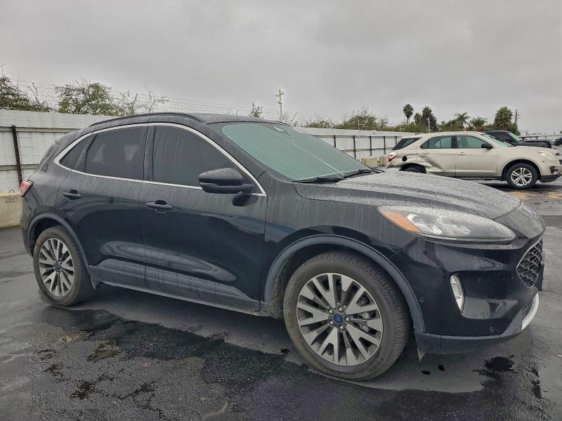 Photo 4 from auction – 2020 FORD ESCAPE TIT with VIN 1FMCU9DZ8LUA79554