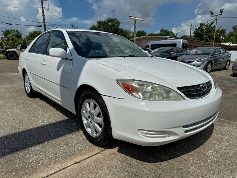 TOYOTA CAMRY LE 2002 with VIN 4T1BE32K52U027812 - Photo from auction