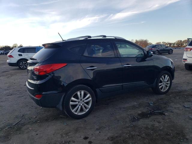 Photo 3 from auction – 2011 HYUNDAI TUCSON GLS with VIN KM8JU3AC3BU242291