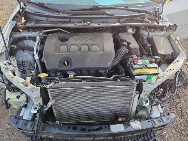 Photo 11 from auction – 2014 TOYOTA COROLLA L with VIN 2T1BURHEXEC023641