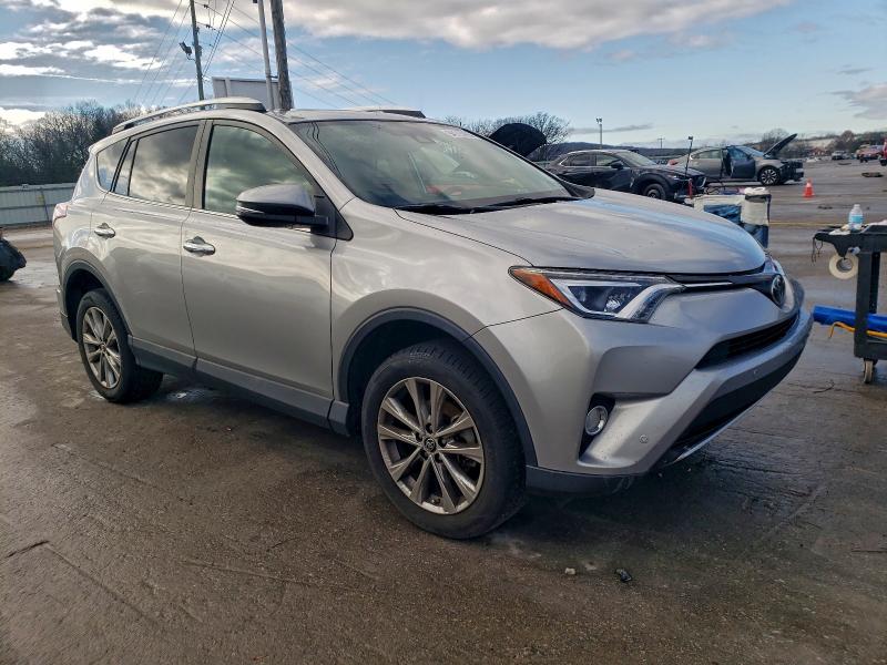 Photo 4 from auction – 2016 TOYOTA RAV4 LIMIT with VIN 2T3DFREV1GW457219