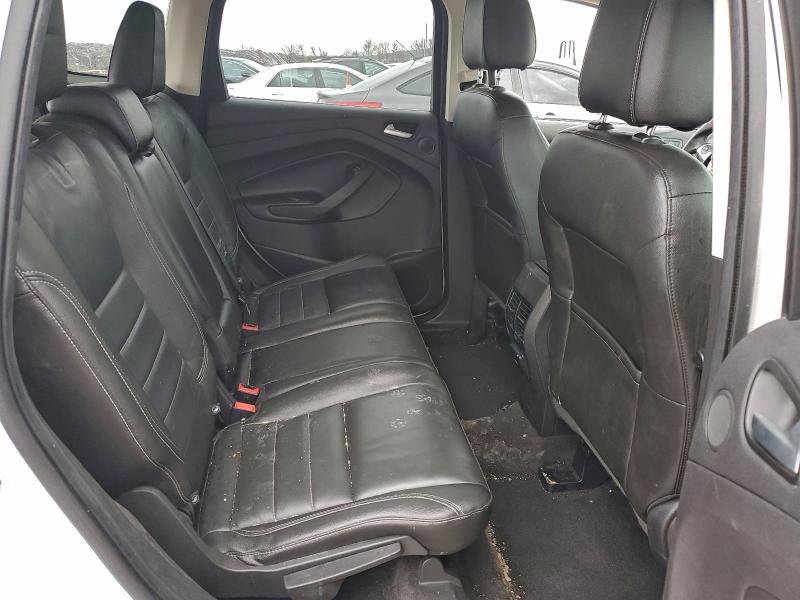 Photo 11 from auction – 2016 FORD ESCAPE SE with VIN 1FMCU9G98GUA57958