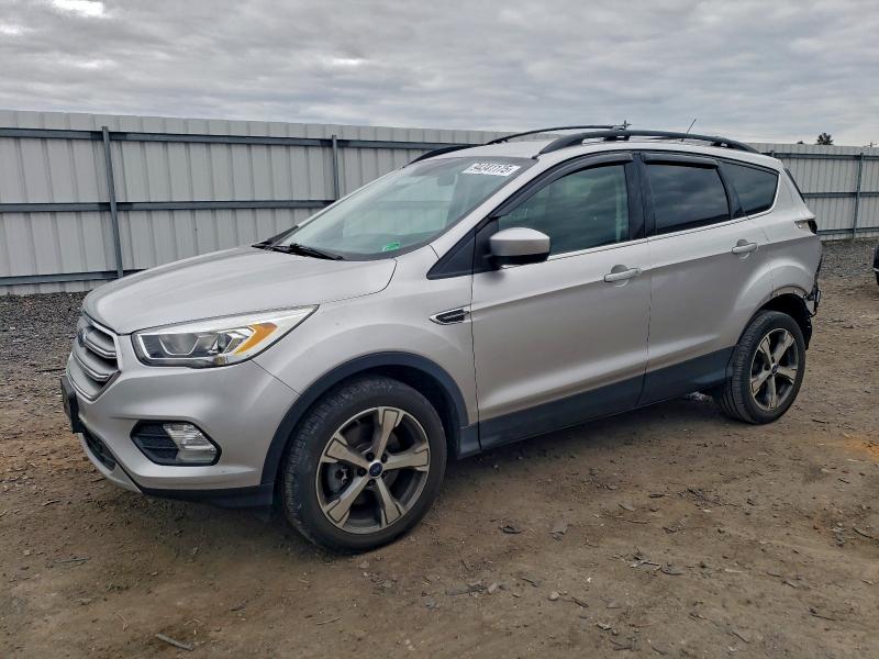 FORD ESCAPE SE 2017 with VIN 1FMCU9G98HUC17161 - Photo from auction