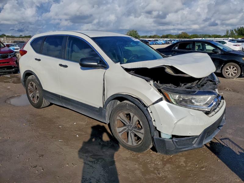 Photo 4 from auction – 2017 HONDA CR-V with VIN 5J6RW5H31HL005083