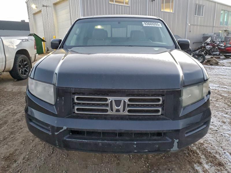 Photo 5 from auction – 2010 HONDA RIDGELINE with VIN 5FPYK1F59AB504028