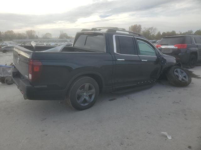Photo 3 from auction – 2023 HONDA RIDGELINE with VIN 5FPYK3F74PB032049