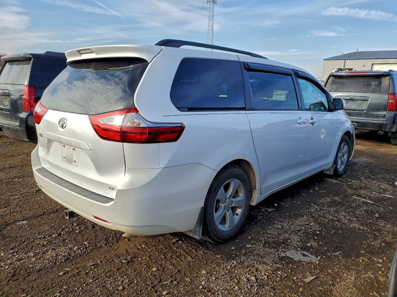 Photo 3 from auction – 2015 TOYOTA SIENNA LE with VIN 5TDKK3DC1FS570281