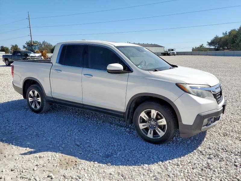 Photo 4 from auction – 2017 HONDA RIDGELINE with VIN 5FPYK3F71HB033239