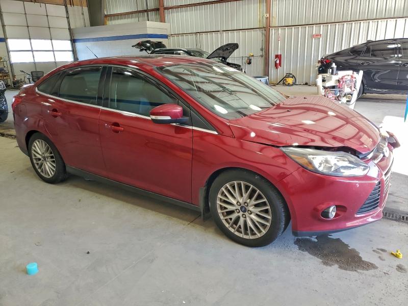 Photo 4 from auction – 2014 FORD FOCUS with VIN 1FADP3J21EL104555