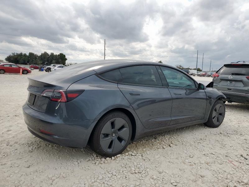 Photo 3 from auction – 2022 TESLA MODEL 3 with VIN 5YJ3E1EA7NF249023