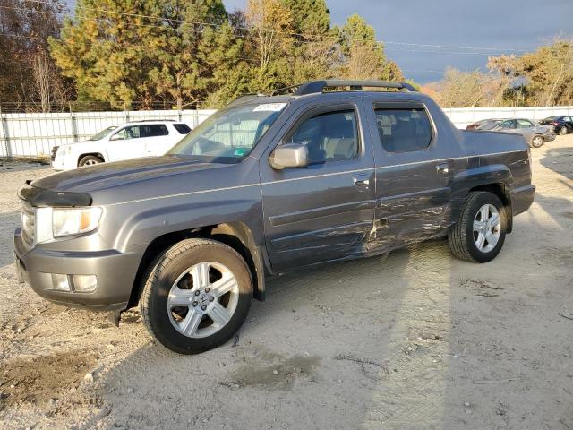 HONDA RIDGELINE 2013 مع رقم تعريف المركبة 5FPYK1F56DB016028 - صورة من المزاد
